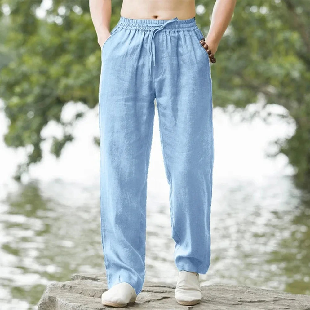 Calça de linho azul-claro com cós elástico e cordão, pernas largas